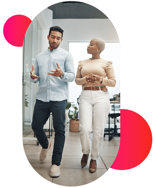 TwoPeopleWalkinginOffice2