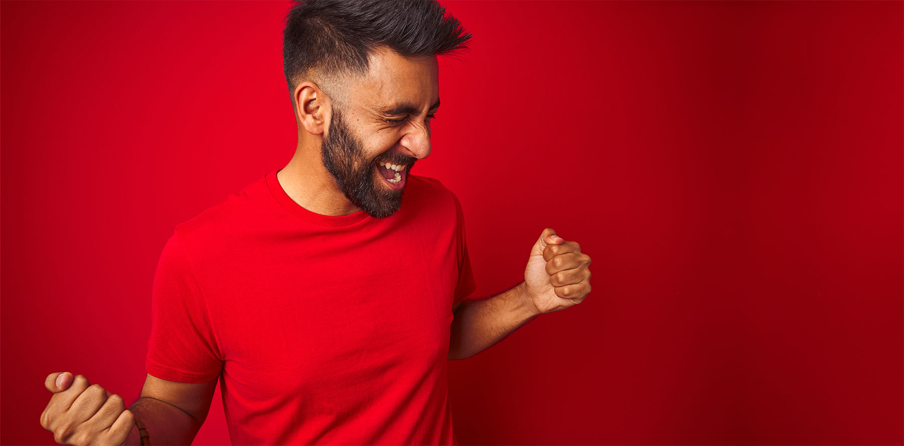 ManExcitedRedBackground
