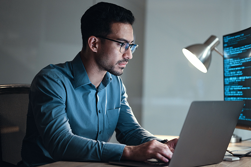Male IT Worker at Laptop